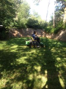 mowing with riding mower